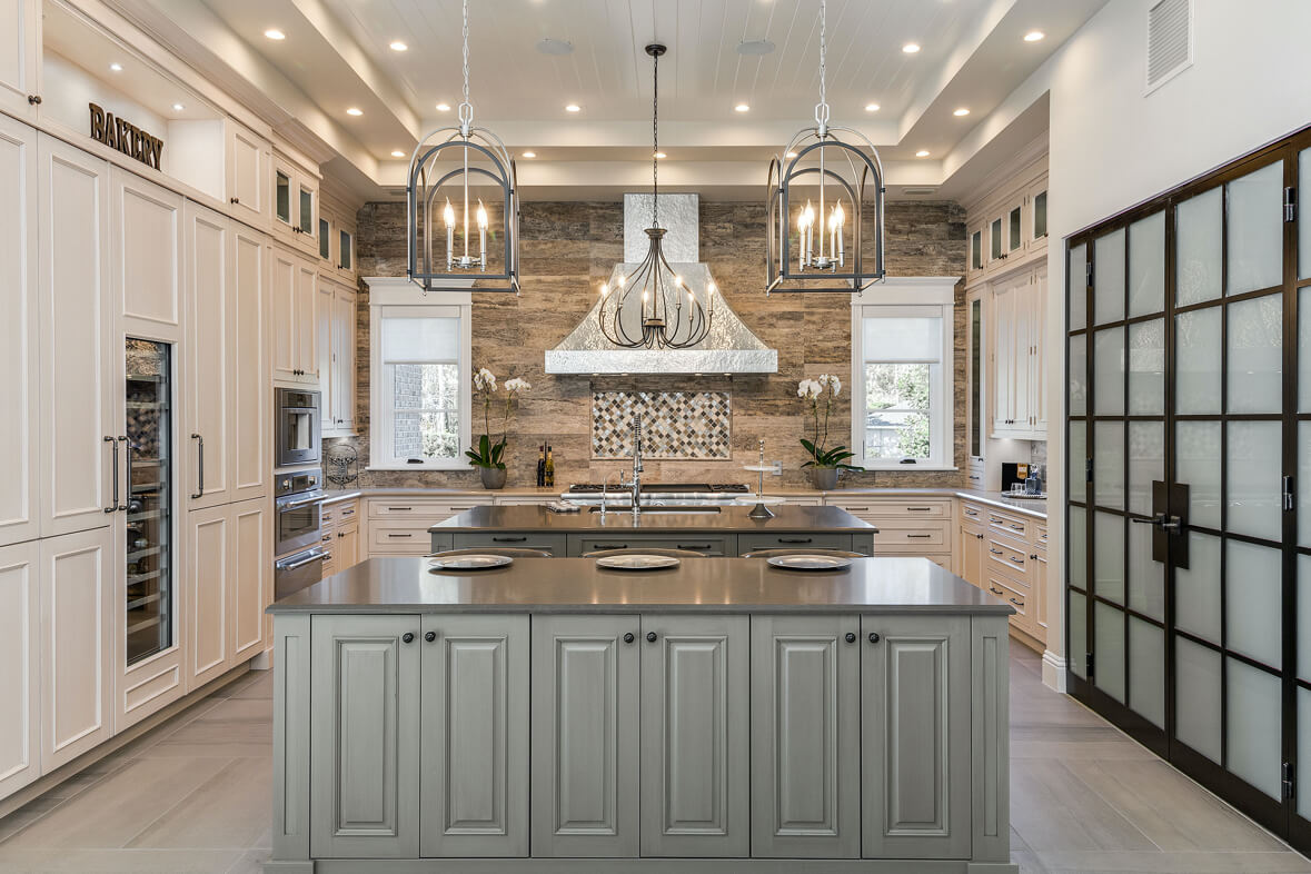 Sophisticated kitchen design with island seating and luxury white cabinets