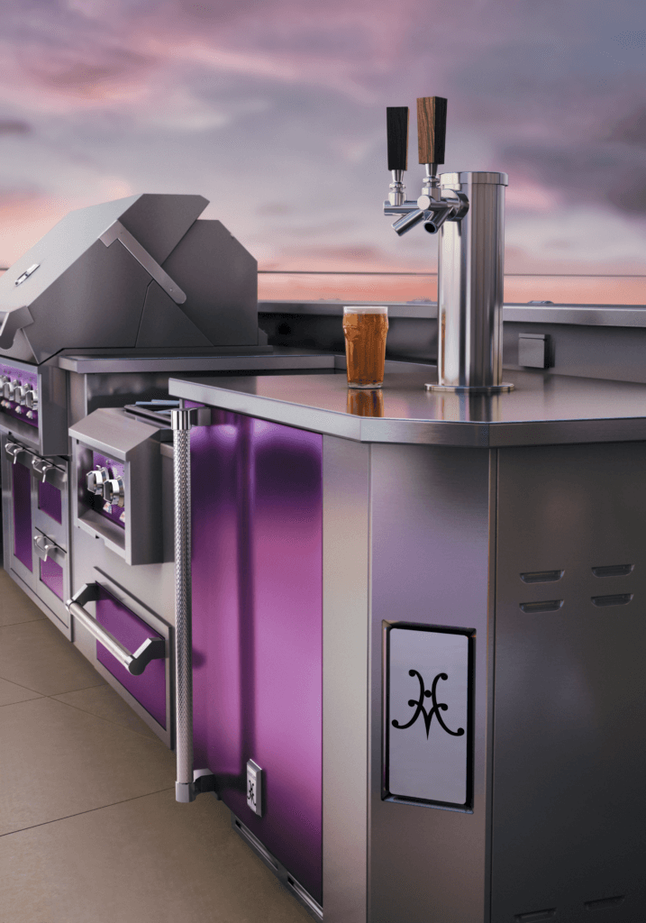 Outdoor Hestan Island Kegerator with purple accents and sunset in background