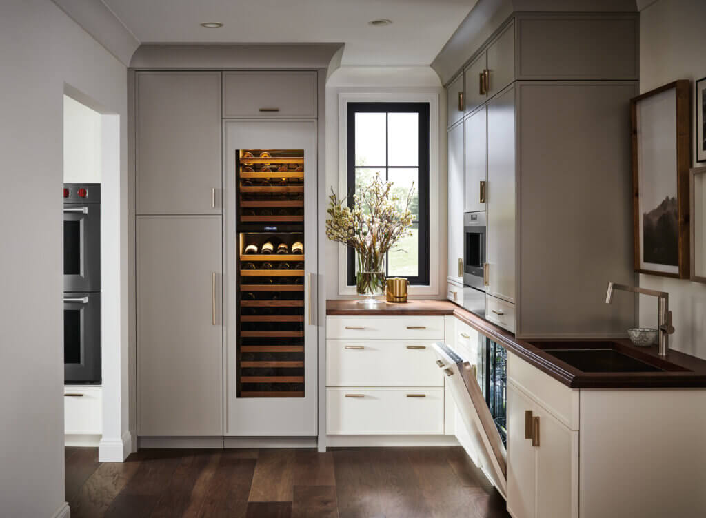 Modern kitchen design with built-in wine cooler and luxury appliances